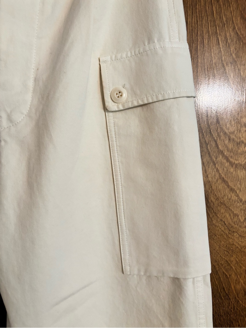 THE GREAT. Convoy Straight-Leg Cargo Pants in Cream - Picture 8 of 12